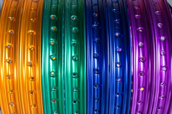 Colorful,Aluminum,Wheels,Of,Motorcycles,On,Shelves