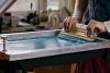 Selective,Focus,Photo,Of,Male,Hands,With,Squeegee.,Serigraphy,Production.